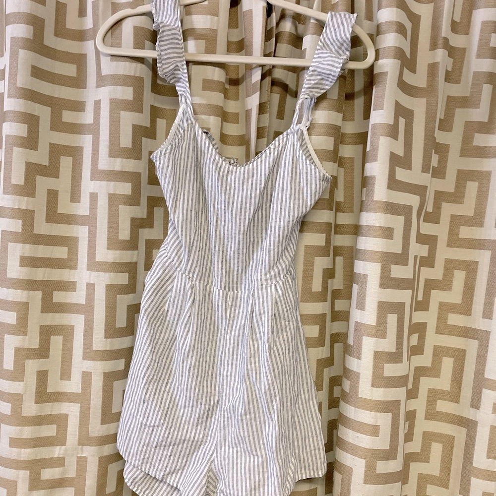 De Ja Vu blue and white striped romper.
